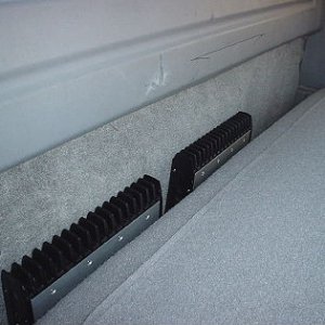 Amps tucked behind backseat