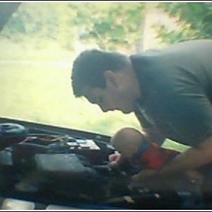 Issac working on the car