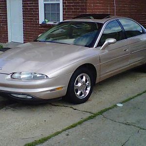 99 olds aurora and 2001 chevy blazer LT