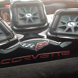 Four 10" L-7s Solos in the rear of a '10 corvette