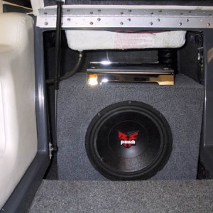 sub under passenger seat of wakeboard boat