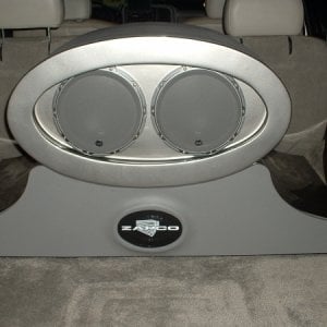 Motorized amplifier rack and subwoofer display