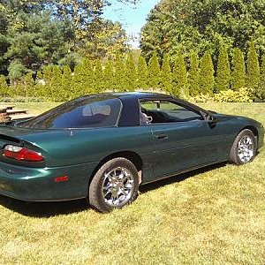 my 1994 camaro z28 with a kenwood ps400m amp and 2 l7 kicker subs. kind of old school.