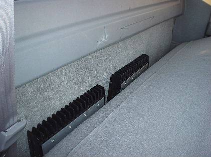 Amps tucked behind backseat