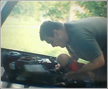 Issac working on the car