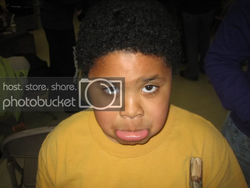 blackkidwithfrown.jpg