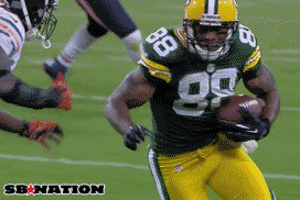 Charles-Tillman-Punches-Ball-Fumble-Packers.gif