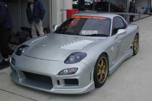 C-West_silver_car.jpg